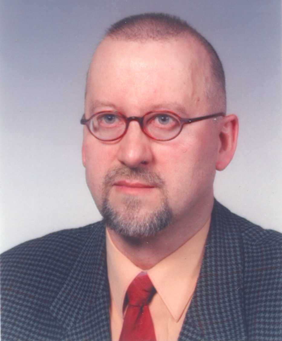 T.KOPEC